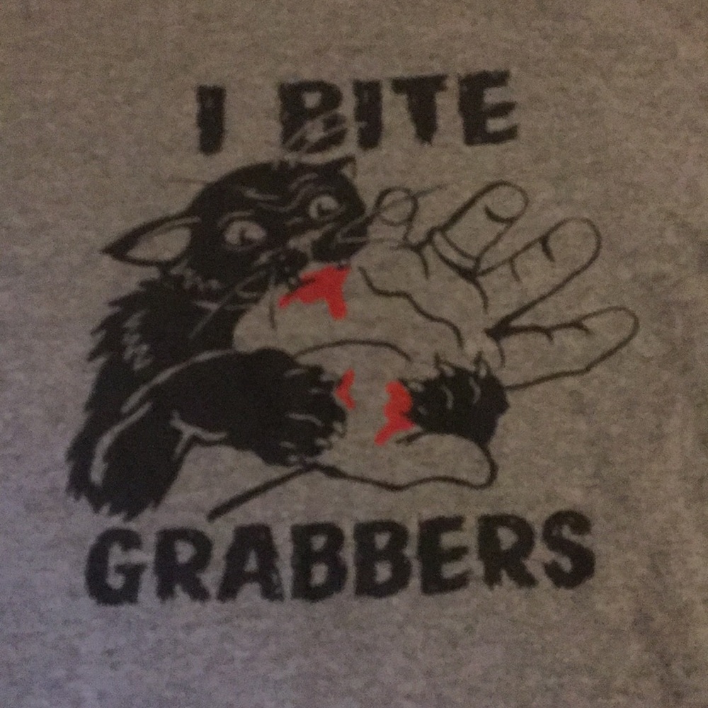 Anti-Trump I Bite Pussy Grabbers T-Shirt